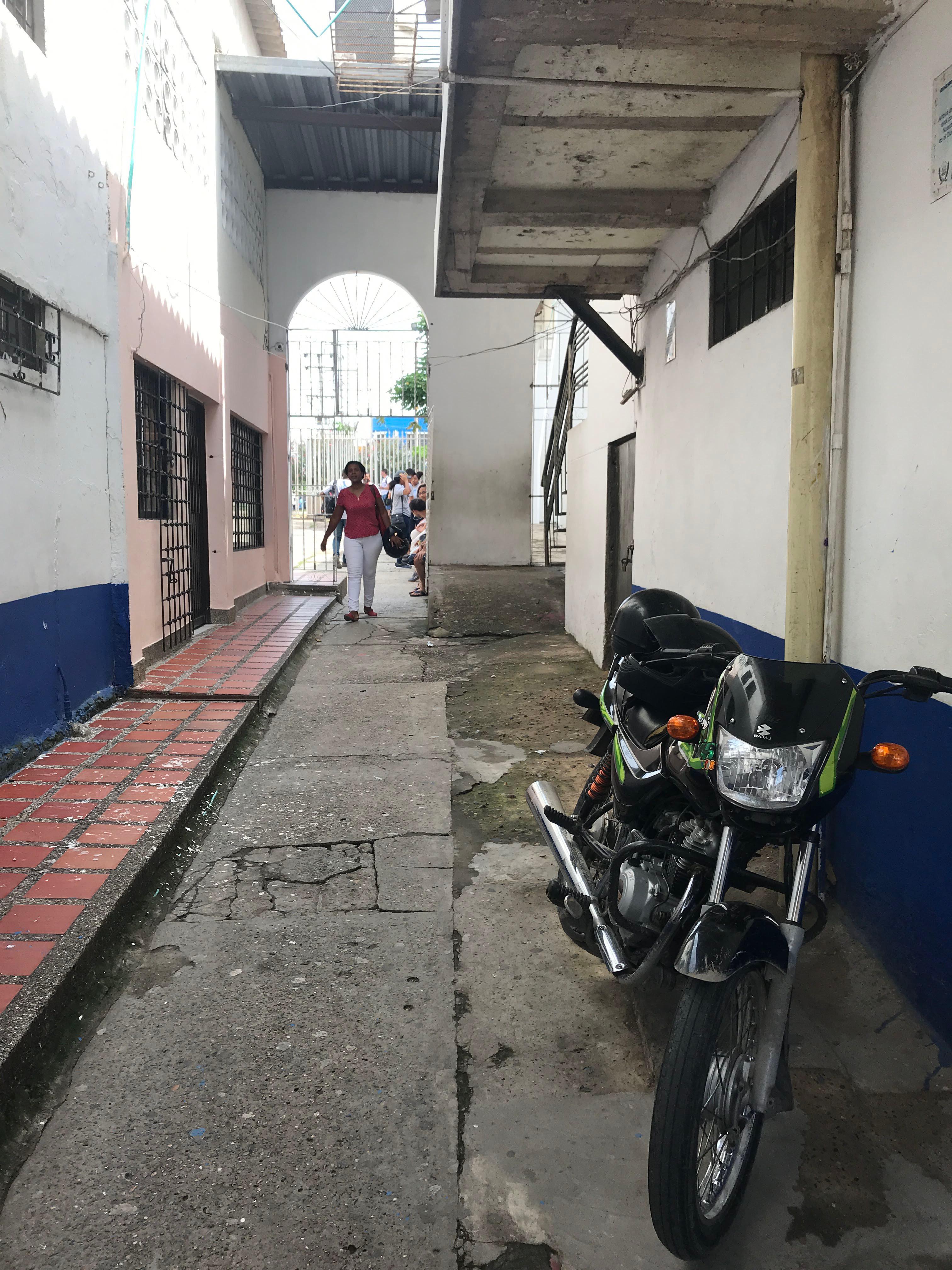 Caribbean coastal town in Colombia featuring beaches, city walls, a church, and night street views