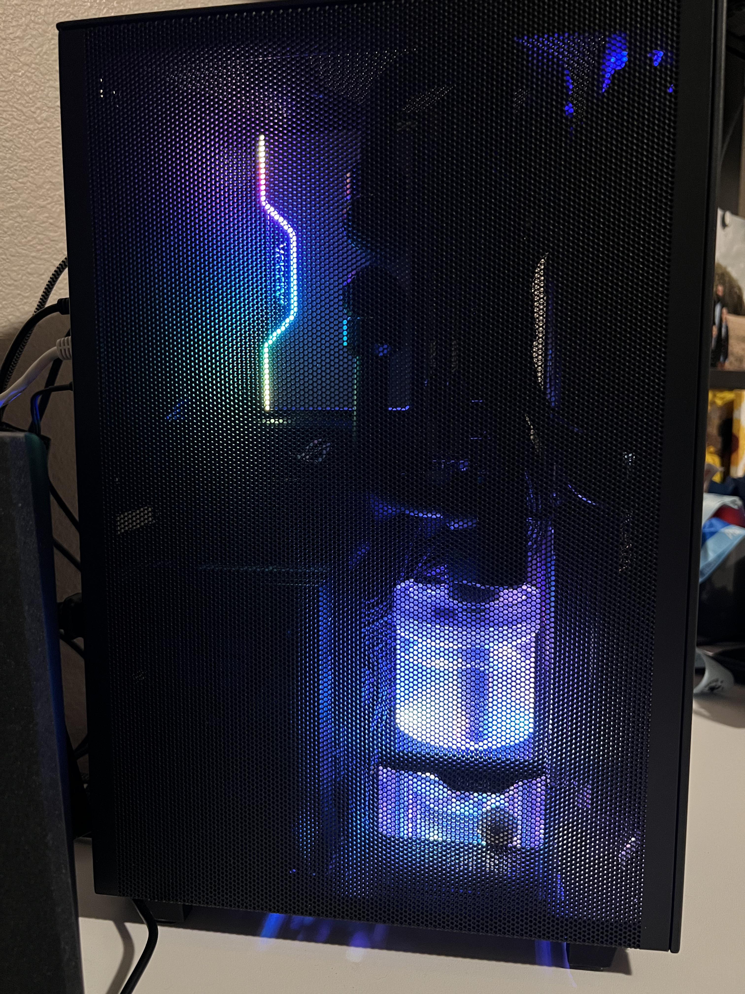 Just finished a custom loop in the Meshlicious. First time Watercooling ...