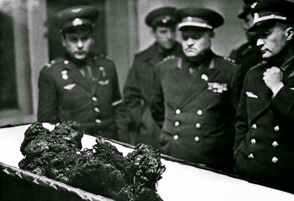 (1967) the open casket of Soviet Cosmonaut Vladimir Komarov. His craft had over 200 known flaws, and his attempts to delay were rejected. Had he refused, his friend Yuri Gagarin would be sent instead. His last audible words, reportedly, were "You have failed and killed me."