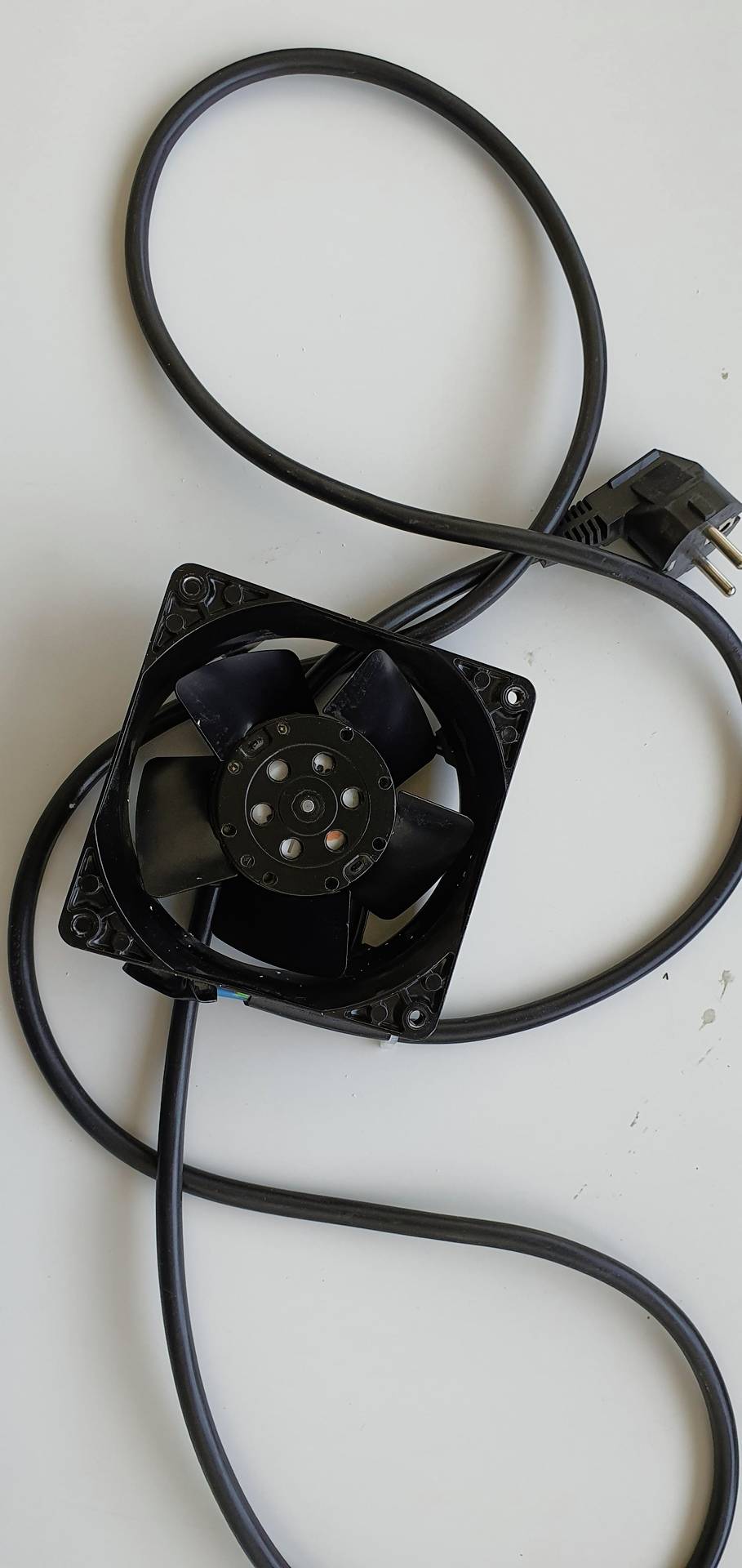 A full metal fan that can be connected directly into a wall plug and yes it can destroy a credit card