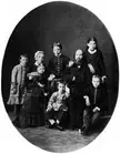 The Ulyanov family in black and white vintage photos, wearing dark formal clothing in an oval frame.