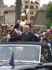 Napolitano in a black convertible car during the Army Parade of the Republic Day with a guard in armor on horseback