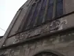 Santa Claus and his reindeer wire sculpture on the stone facade of the Guildhall on Bore Street, Lichfield