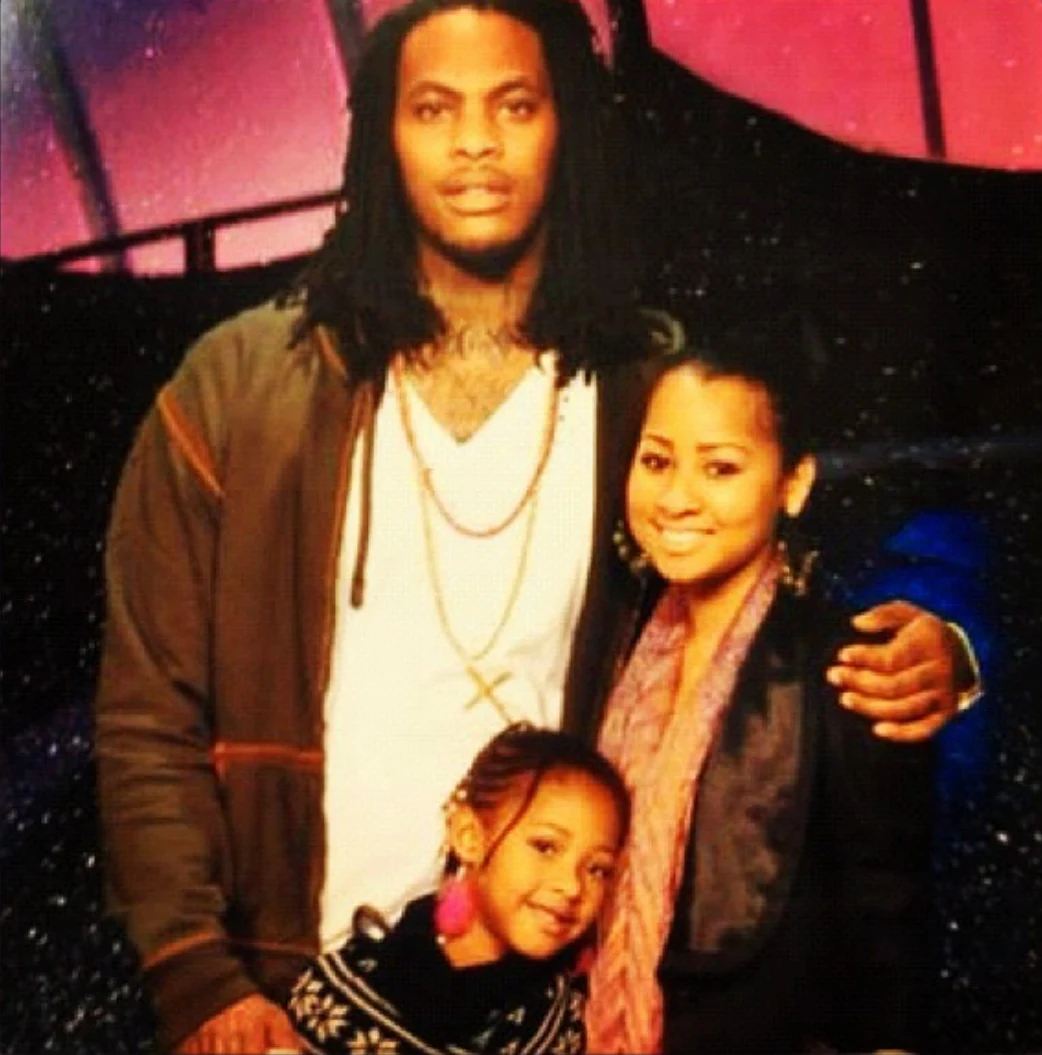Waka Flocka with his wife Tammy Rivera and their daughter Charlie