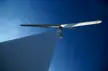 Somerset Wind Farm white wind turbine against a clear blue sky, minimalist 4k desktop wallpaper