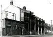 Black and white vintage photo of the Central Cooperage Chas. Rasmussen & Co at the Darling House site in Millers Point