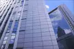 Doppelter Messeturm skyscrapers with glass and metal facades against a blue sky