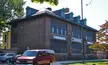 Fayette School in October 2010 featuring a red van and brick building with Politz Hebrew Academy signs