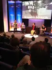 Roberto Marson's daughter receiving the Visa Paralympic Hall of Fame award on a stage in London