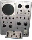 Tektronix Type 575 Transistor-Curve Tracer with a circular oscilloscope screen and vintage control panel