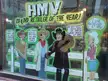 HMV store window display with funny cartoon comics of a group in cowboy hats, boots, and blue jeans