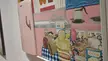 Pop art oil painting of a vintage kitchen with a pink refrigerator, cereal boxes, and canned goods.