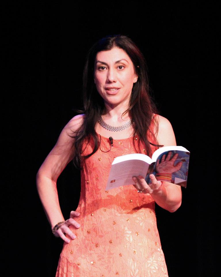 Oksana Marafioti reading an excerpt from her book, American Gypsy, at the book launch