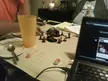 Dungeons and Dragons session with miniatures, dice, and a laptop on a table