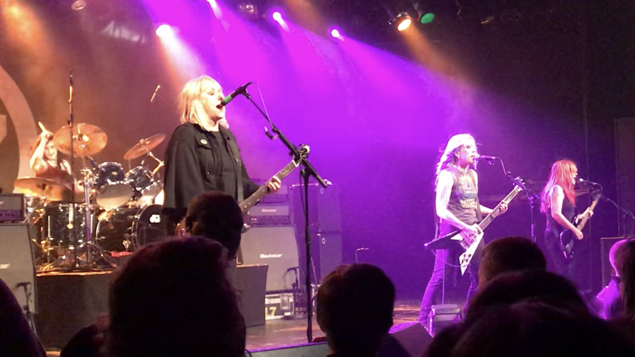 Dee Plakas (left) performing with L7 in Vancouver, BC in 2019
