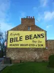 Ghost sign advertising Bile Beans painted on a brick building in York, England