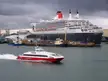 Queen Mary 2 at the new Ocean Terminal, with Isle of Wight passenger ferry Red Jet 3