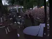 Kanye West concert view from the stage looking out over a dense crowd of people in streetwear