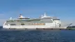 Royal Caribbean International cruise ship Brilliance of the Seas docked at a harbor pier