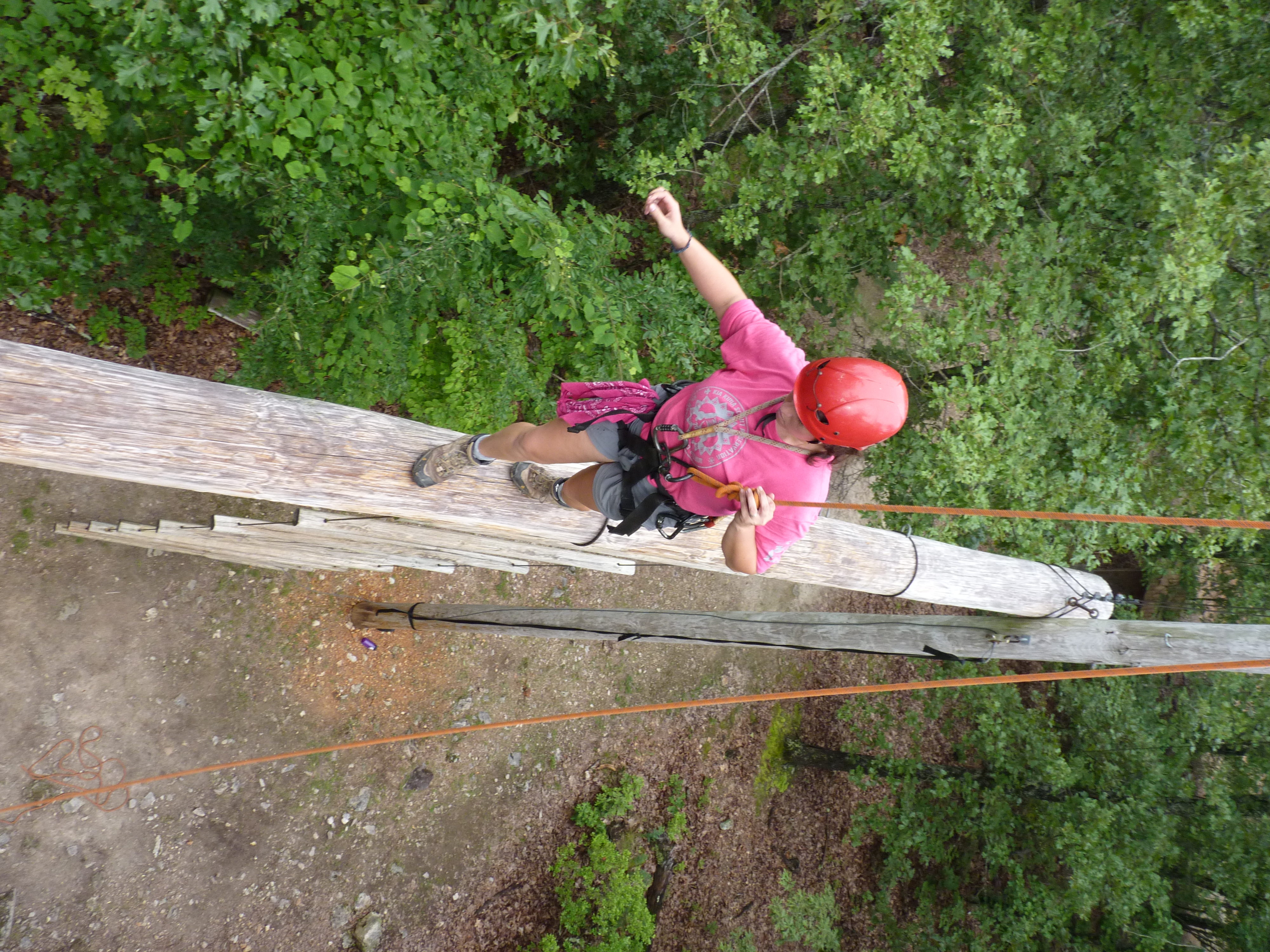 A Venturer traverses a COPE High Ropes course. | Scrolller