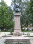 Bronze bust of Anders Chydenius on a granite pedestal in a Kokkola park