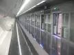 Station of L9 subway platform with polished floors and glass platform screen doors