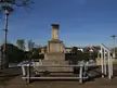 The London Stone monument on a paved riverside area by the River Thames in Staines