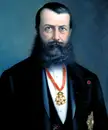 Fine art oil painting of Guillem d'Areny-Plandolit in a black suit with a gold medal on a red ribbon.